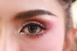 © naraichal - Beauty and fashion makeup , close up beautiful eye .Eye makeup woman applying eyeshadow powder