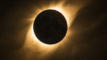 A Solar Eclipse With The Moon Covering The Sun.