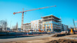 © Artistic Visions - Sunny Skies Overseeing Construction with Tower Cranes