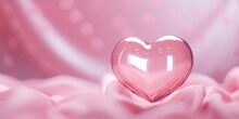 A Heart Shaped Glass Object On A Pink Background. Perfect For Valentine's Day Or Romantic-themed Designs