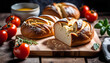 Homemade bread (rye and wheat) with tomatoes, healthy breakfast or snack on a wooden table,