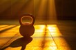 Silhouette of a yellow competition kettlebell on a gym floor with empty space to add text above it