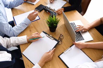 Wall Mural - Business people negotiating at table in conference hall, closeup