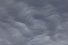 Cloud Cover Of Wavy Dark Asperitas Clouds In The Sky