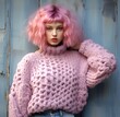 © Gromik - model in a knitted pink sweater and pink hair