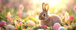 Cute Easter rabbit with decorated eggs and spring flowers on green grass at sunny day. Little bunny in the meadow. Happy Easter celebration concept. Design for banner, greeting card, postcard