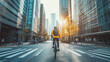 © Kamonwan - urban cyclist rides through the empty streets of the city at sunrise, with the golden light