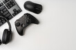 © fotofabrika - Top view of gamer table with computer keyboard, joystick and headphones