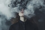 Fototapeta Sypialnia - A mysterious woman exudes an air of darkness and intrigue as smoke billows from her face, shrouding her in a captivating aura