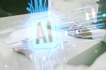Wall Mural - double exposure of creative artificial intelligence icon with hands typing on laptop on background. 