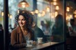 woman in a cafeteriat with a coffee through glass, blurred glass background,