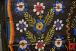 Fragment of a clothing chest painted with floral motifs, used for storing clothes or other household items. Made in Ukraine in the 19th century.