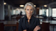 © AlfredoGiordano - horizontal portrait of a beautiful middle age businesswoman wearing a dark elegant suit Generative AI