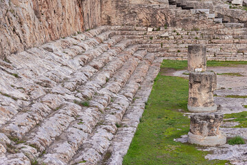 Wall Mural - Rows of stone benches in Telesterion, the place for initiations. Ruins of the ancient sanctuary of Demeter and Kore at Eleusis. Elefsina, Attica, Greece