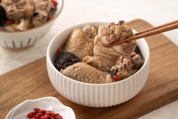 Wall Mural - Delicious shiitake mushroom chicken soup, traditional Taiwanese soup.