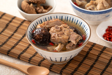 Wall Mural - Delicious shiitake mushroom chicken soup, traditional Taiwanese soup.