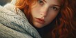 A close-up shot of a woman with vibrant red hair. This image can be used to depict beauty, fashion, or individuality