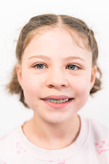 Little girl with rainbow braces