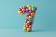 Number 7 made out of colorful balloons with a solid background. Age, anniversary, birthday, party celebration background.
