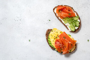 Wall Mural - Scrambled eggs with smoked salmon and whole wheat toast