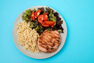 Sticker - grilled cutlets burger with boiled rice and salad