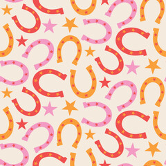 Retro horseshoe seamless pattern in orange, red and pink with stars. For wallpaper, fabric and textile