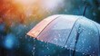 © buraratn - transparent umbrella under rain against with water drops background