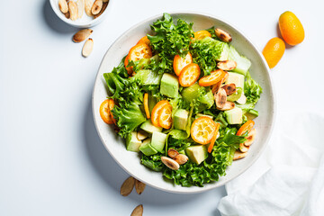 Wall Mural - Kumquat salad with avocado and nuts.