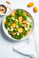 Wall Mural - Kumquat salad with avocado and nuts.