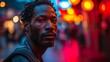 © Marin Zhu - Portrait of a handsome African man with dark skin. Concept: pronounced facial features, illuminated in such a way as to highlight the details and texture of the face