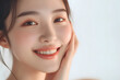 © Oksana - Closeup Beautiful smiling asian korean woman touch face with smooth healthy skin