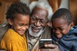 Grandfather and Grandchildren Sharing a Laugh While Looking at Phone