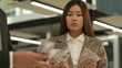 © Yuliia - Sad offended upset Asian woman Korean businesswoman hold little money look at businessman colleague with many cash man count banknotes inequality equal pay racial discrimination business injustice