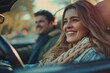 © Artofinnovation - Happy couple sitting inside a car smiling