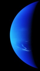 Wall Mural - vertical video of neptune rotating in space half lit by the sun concept