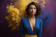 Portrait of a beautiful brunette woman in a blue dress and yellow smoke.