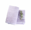 Violet terry towels and eucalyptus branch isolated on white, top view
