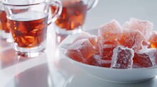 Turkish Delight And Tea On A White Background. Selective Focus.