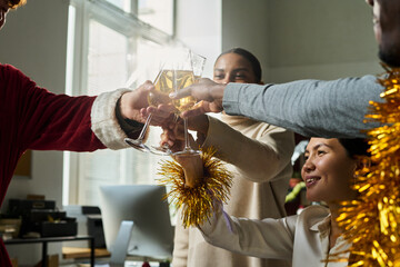 Poster - Group of happy young intercultural managers toasting with sparkling champagne for good luck in business while enjoying, office party