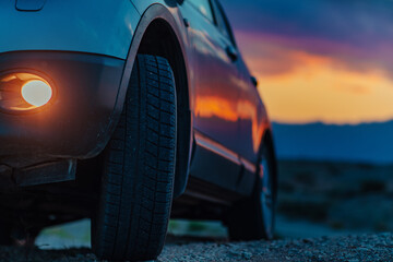 Poster - Car off-road travel at twilight