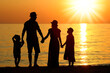 A happy family by the sea in nature silhouette weekend travel