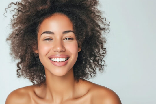 young woman smiling whit perfect skin and copy space, skincare concept.