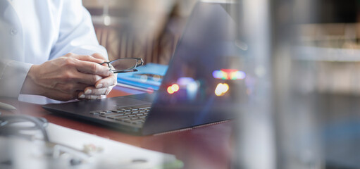 the concept of conducting a doctor consultation online in a office.