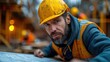 © Vasiliy - Handsome engineer man and architect working at construction site with calculate spending report