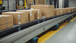 © SR07XC3 - Close-up of multiple cardboard box packages moving along a conveyor belt in a warehouse