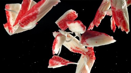 Sticker - Fresh crab sticks fly up and fall down. Filmed on a high-speed camera at 1000 fps. High quality FullHD footage