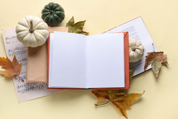 Poster - Composition with books, pumpkins and fallen leaves on color background