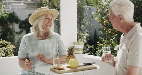 Poster - Old couple, laugh and drinking outdoor for fruit snack in garden, diet or retirement. Man, woman and talking in nature together for summer relax or pineapple eating or organic, wellness or healthy