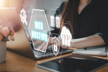 Wall Mural - web hosting concept, business woman using laptop computer on office desk with web hosting icon on vi