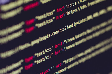 Developer screen with colored website programming code